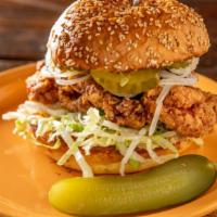 Panko-Crusted Fried Chicken Sandwich · Breaded chicken with coleslaw, bacon, American cheese and jalapenos. Topped with sunny side ...