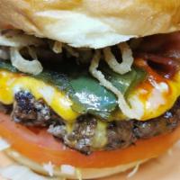 Firehouse Burger · Topped with a whole roasted jalapeno, Colby and Monterey Jack cheese blend, bacon, onion rin...