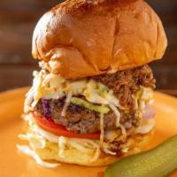 Carolina Burger · Topped with slow-cooked pulled pork, pepper jack cheese and homemade coleslaw. Served with g...