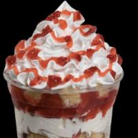 Strawberry Shortcake Sundae Dasher® · Layers of vanilla ice cream, strawberries, and pound cake topped with whipped cream and stra...