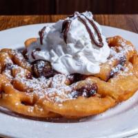 Irish Whiskey Funnel Cake · Whiskey-infused funnel cake, Hailey's chocolate drizzle.
