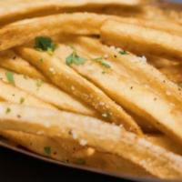 Small Hand Cut French Fries · Our house made, hand cut potato french fries. Dusted with Romano cheese and parsley.