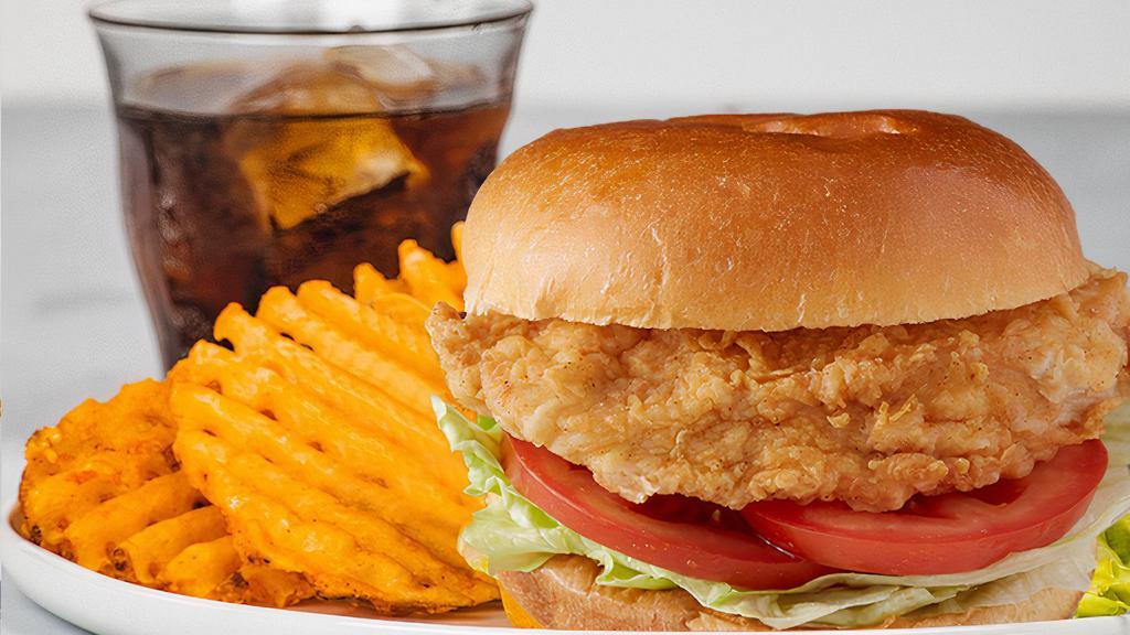 Classic Chicken Sandwich Meal · Grilled or Fried Chicken Breast, Served with Lettuce, Tomato, your Favorite Flavor, Regular Waffle Fries, and a Drink! 700-2,478 cal.