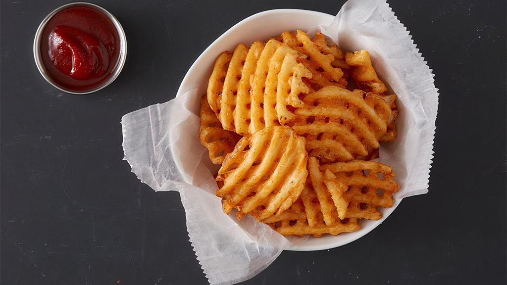 Waffle Fries (Tray) · Party tray of our signature seasoned, skin-on, waffle cut fries! 2,320-2,640 cal.