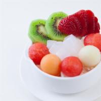 Coconut Combo · Coconut fried ice-cream top with mixed fruits.