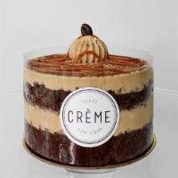 Caramel Mocha · Layered with semi-sweet espresso cream and drizzled with rich dulce de leche.
