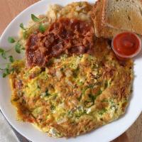 Meat Omelette · Bacon, ham or sausage. Served with toast and home fries.