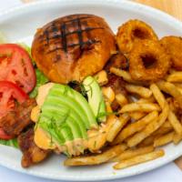 Plain Backyard Burger · Most popular. Avocado, cheddar cheese, bacon and chipotle mayo. Served on a sesame bun with ...
