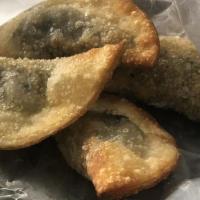 4 Pieces Spinach Samusa · Afghan homemade dumpling filled with spinach, garlic and spices, lightly fried and served wi...