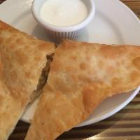 1 Piece Bolanee  Kachalou · Fried turnovers filled with mashed potatoes, seasoned with herbs and spices and served with ...