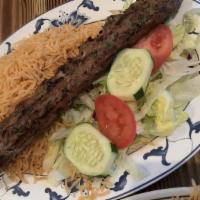 Lamb Kofta Kebab · Ground lamb marinated in fresh grated spices, broiled over wood charcoal.