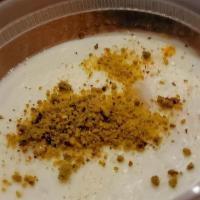 Firnee · Special Afghan pudding with almonds and pistachio nuts.