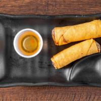 Vegetable Spring Rolls · 3 pieces. Fried crispy vegetable rolls wrapped with bamboo shoots, cabbage, carrots and bean...