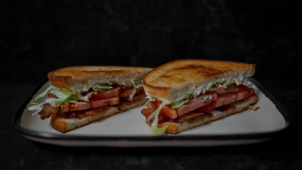 Blt · double-smoked bacon, lettuce, tomato, mayo on toasted sourdough.