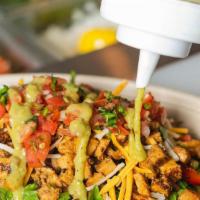 Carnitas Fajita Bowl · OUR FAMILY RECIPE! TENDER, SLOW-ROASTED, THREE-CHILE PORK - Served rice or lettuce. Topped w...