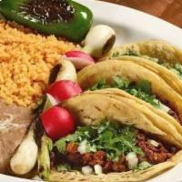 Taco Dinner | Rice & Beans (Con Arroz Y Frijoles) · 3 Delicious Classic Mexican Tacos With Your Choice Of Meat + Side Of Mexican Style Yellow Ri...