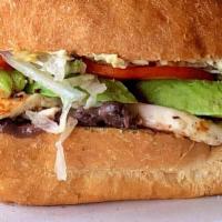Vegetarian Tortas (Sin Carne) · Mexican Style Sandwich, Pan Toasted Telera Roll, Refried Beans, Avocado Slices, Jalapeños, L...