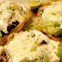 Vegetarian Sopes (Sin Carne) · 3 Savory Sopes Made With Thick Corn Tortillas, Refried Beans, Avocados, Lettuce, Tomatoes, S...