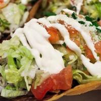 Tostadas · 3 Tasty Tostadas Made With Your Choice Of Meat, Crispy Fried Corn Tortillas, Refried Beans, ...