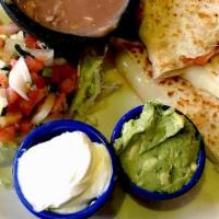 Cheese Quesadillas · Extra Cheesy Quesadillas Wrapped In A Flour Tortilla With Your Favorite Toppings + Small Sal...