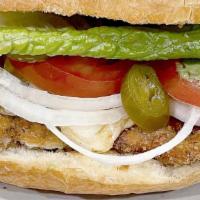 Chicken Milanesa Torta · Mexican Style Sandwich With Chicken Milanesa, Pan Toasted Telera Roll, Refried Beans, Avocad...