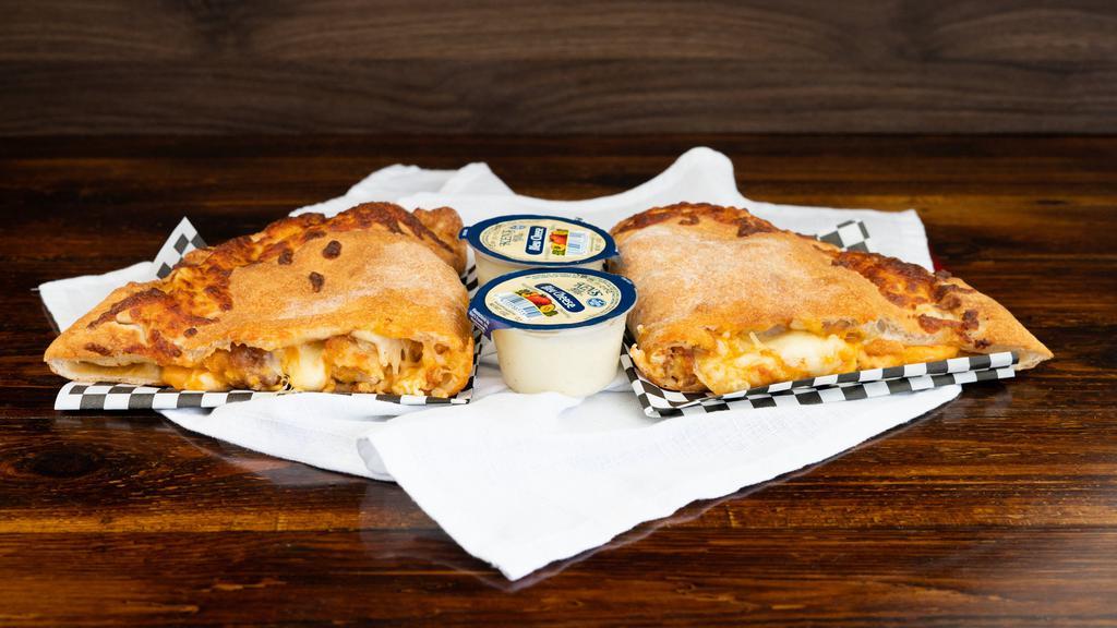 The Buffalo Blue · Served with two two-ounce blue cheese.