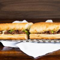 Philly Cheesesteak · Steak, onions and peppers, mozzarella cheese, and mayo.