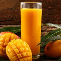 Mighty Mango Shake · Smooth shake made with mango, bananas, vanilla protein powder and your choice of milk.