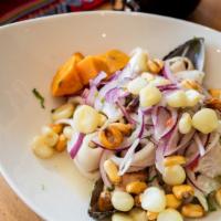 Ceviche Mixto · Fish, calamari, octopus, shrimp, mussels marinated in lime juice served with onions, sweet p...