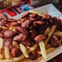 Salchipapa · Fries mixed with fried sausages.