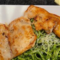 Tallarin Verde Con  Pechuga · Spaghetti in a basil and spinach sauce served with  grilled chicken.