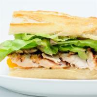 Grilled Chicken Sandwich · With lettuce and tomato.
