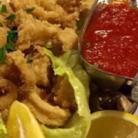Fried Calamari · Served with sweet or hot sauce.