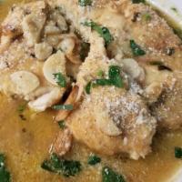 Chicken Scampi · Tender chicken breast, garlic, breadcrumbs, wine, butter, and lemon.