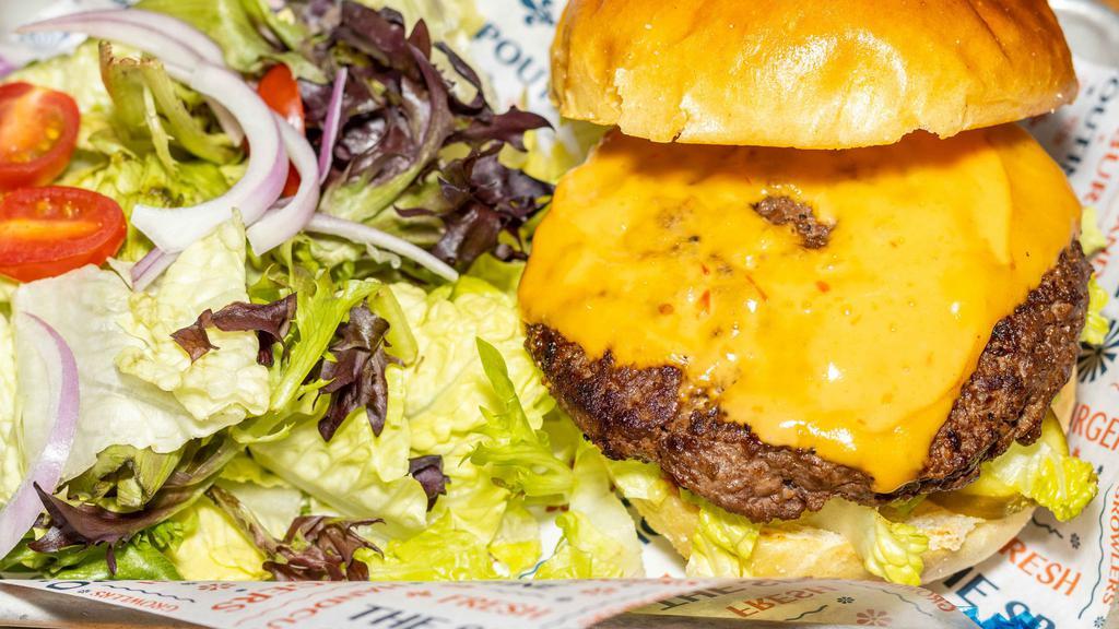 The Wac Arnold · Our beef burger topped with, special sauce(Thousand Islands Dressing), lettuce, American Cheese, pickles, and red onion on a brioche bun.