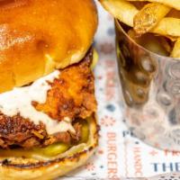 Dirty Bird · Buttermilk-fried chicken breast, pickled jalapenos, dill pickles, cheddar cheese, & chipotle...