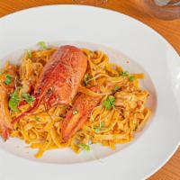Lobster Pasta · Fettuccini, brandy and fresh herbs.