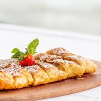 Bougatsa · Fillo dough filled with custard and topped with powdered sugar. Great for 2-3 people