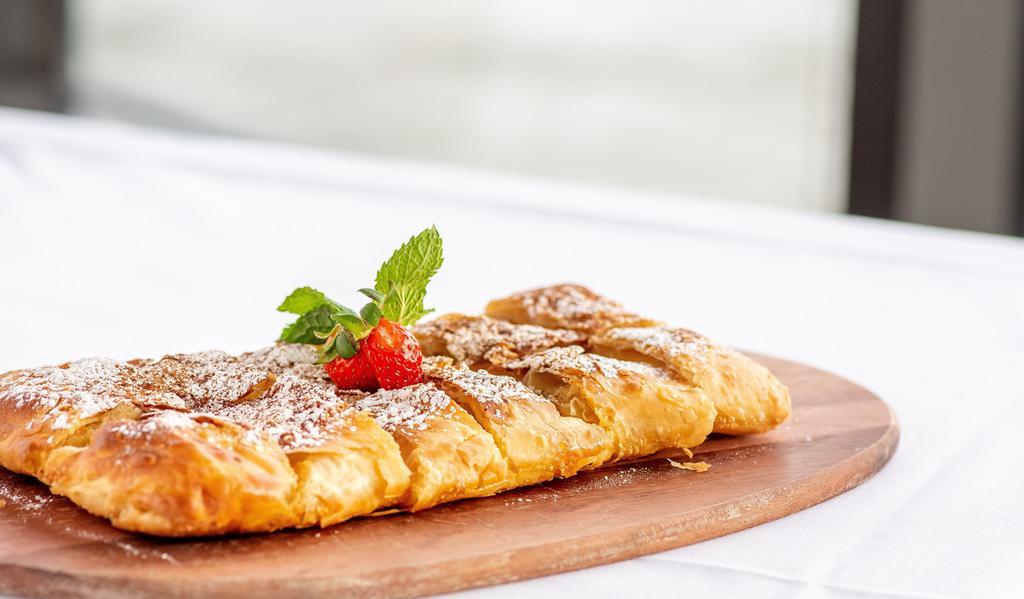 Bougatsa · Fillo dough filled with custard and topped with powdered sugar. Great for 2-3 people