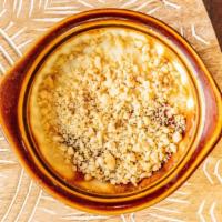 Rice Pudding  · Baked	pudding made with rice	and whole milk. Topped with cinnamon.