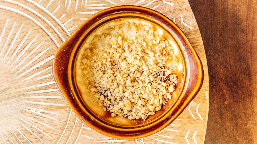 Rice Pudding  · Baked	pudding made with rice	and whole milk. Topped with cinnamon.