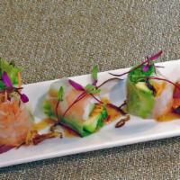 Summer Roll  · Cooked shrimp, avocado, cucumber, greens, carrot wrapped in rice paper, sweet chili miso sau...