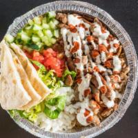 Beef & Lamb Gyro Bowl · Romaine, rice, tomato and cucumber salad, and onions.