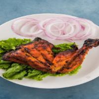Tandoori Chicken Holy Moly · Bone-in chicken marinated in yogurt and house spices cooked to perfection in an Indian clay ...