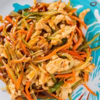 Shredded Pork With Garlic Sauce · Shredded pork sautéed with water chestnuts, bamboo shoots, green pepper, carrots, onion, mus...