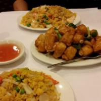 General Tso Chicken · Family recipe, crispy chicken and spicy special sauce.