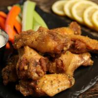 Lemon Pepper · 8 lemon pepper wings, served with carrots & celery and a choice of blue cheese or ranch for ...