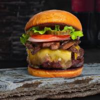 Must Be Mushroom Vegan Burger · Seasoned plant-based patty topped with mushrooms, melted vegan cheese, lettuce, tomato, onio...