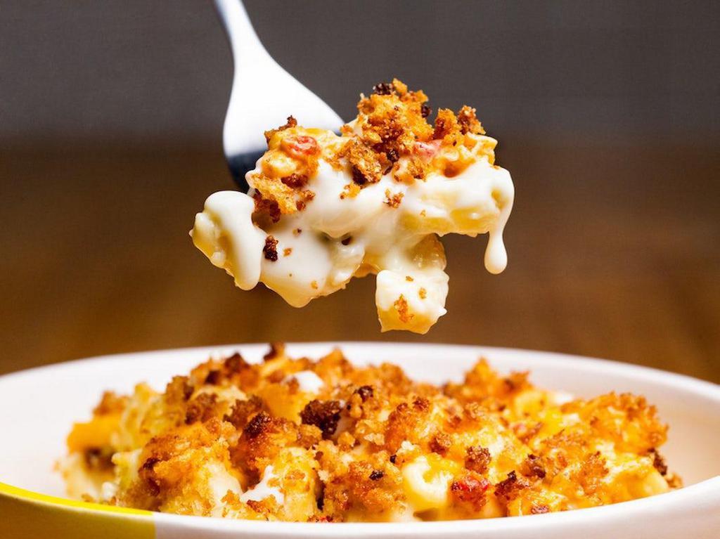 Pimento Mac · Our Signature Three-Cheese Blend, Pimento Cheese, and Homemade Bread Crumbs.