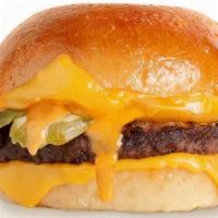 Cheeseburger · 100% Black Angus Beef Patty, American & Aged Cheddar, Dill Pickles & Burger Sauce On A Potat...